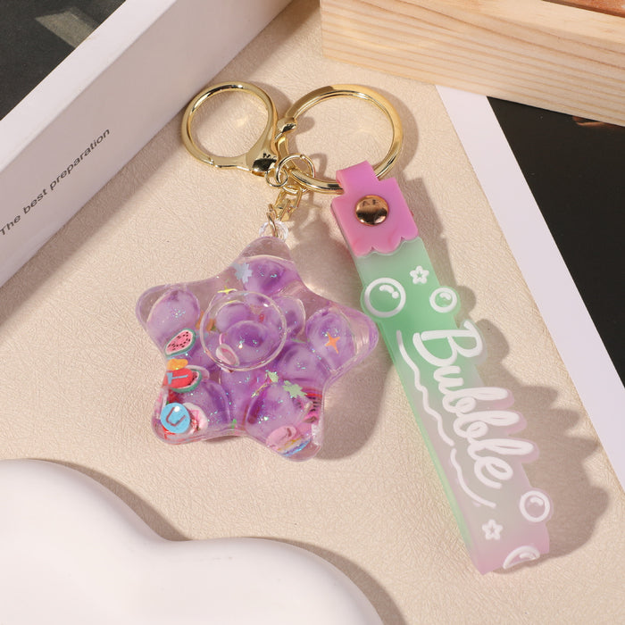 Wholesale five-pointed star flower quicksand bottle creative colorful cartoon bag key chain jewelry small pendant ornaments color