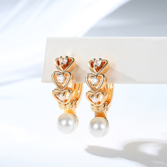 Wholesale Copper gold-plated retro light luxury simple pearl earrings, small and fashionable design, inlaid with zircon ear buckles, wholesale of ear accessories