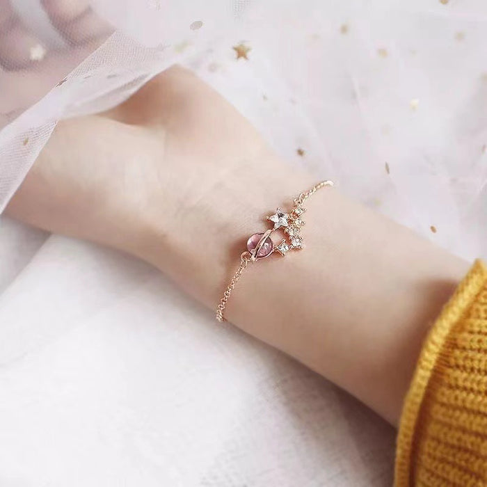 Wholesale Dreamy starry sky colorful planet pink cat' s eye bracelet
