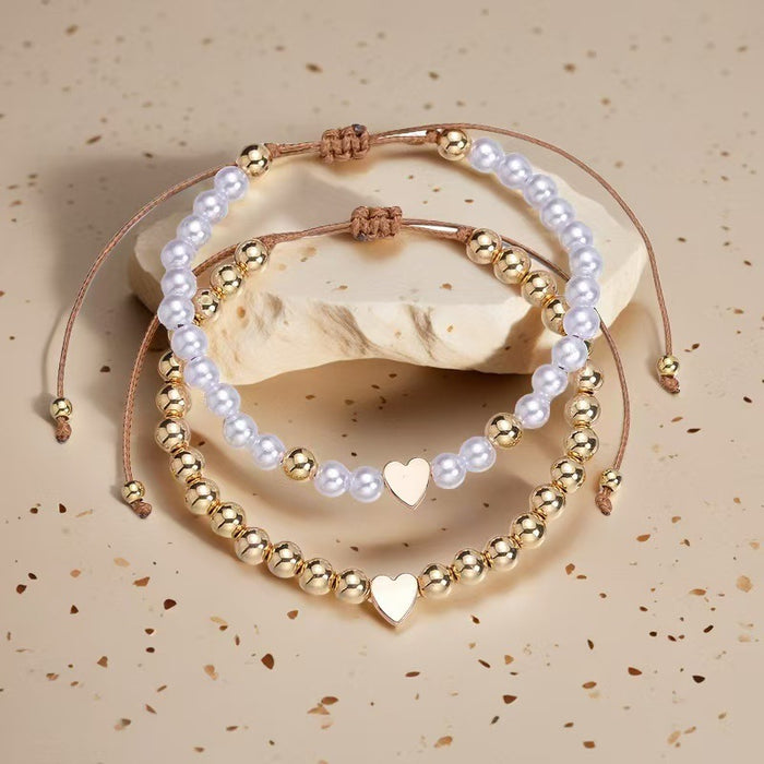 Wholesale Simple imitation pearl metal round bead heart-shaped bead bracelet set with adjustable drawstring bracelet