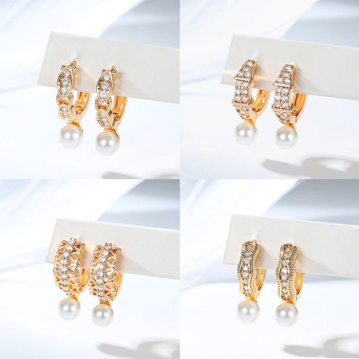 Wholesale Copper gold-plated retro light luxury simple pearl earrings, small and fashionable design, inlaid with zircon ear buckles, wholesale of ear accessories