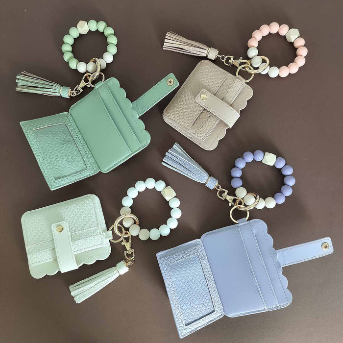 Wholesale silicone beads Wrist ring keychain card holder leather flying wing embossed color matching large capacity card holder