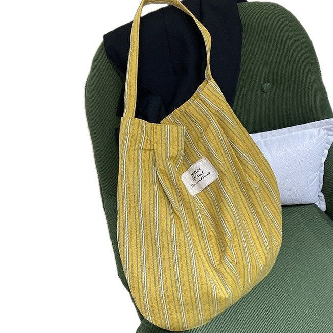 Wholesale Splicing striped canvas bag with simple temperament and large capacity commuting shoulder bag