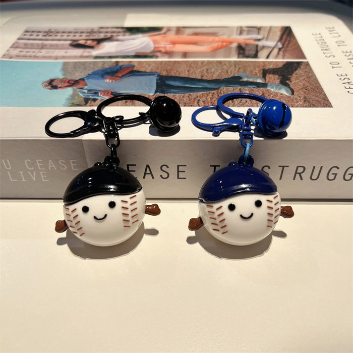 Wholesale Cute PVC cartoon baseball keychain with smiling face.