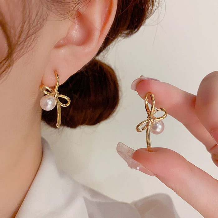 Wholesale Bow Pearl Earrings JDC-ES-HanDu005