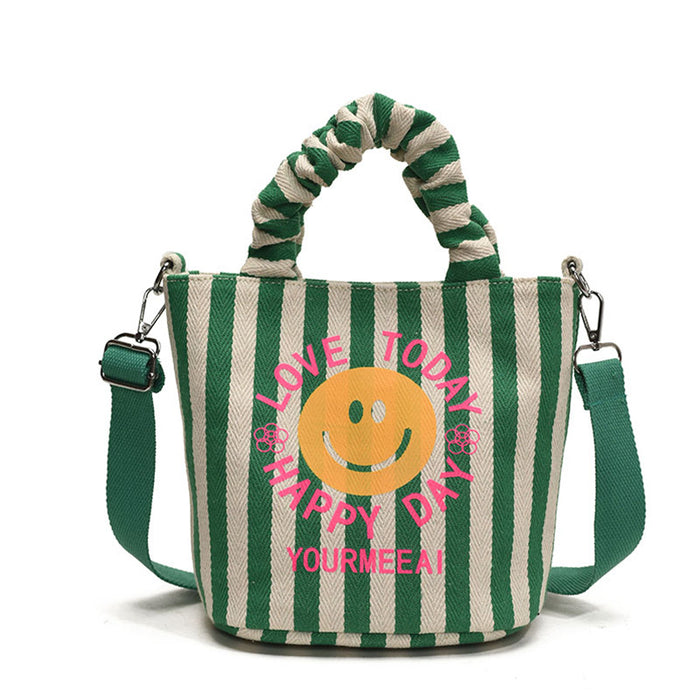 Wholesale Canvas bag, cute smiling face handbag, striped crossbody bag, commuting shoulder bag