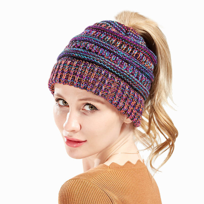 Wholesale Winter Multicolor knitted hat for women with a ponytail opening.