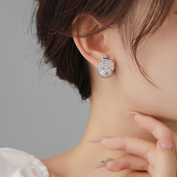 Wholesale Swan full diamond zircon pearl earrings, light luxury and high-end earrings, new silver needle fashionable and personalized earrings for women