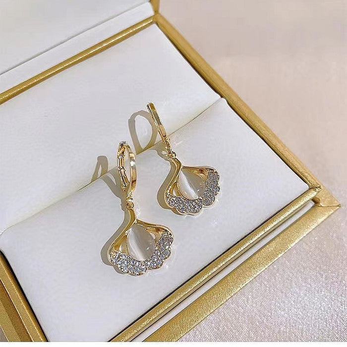 Wholesale Personalized cat eye stone ginkgo leaf earrings with niche design, high-end and trendy ear loops and accessories