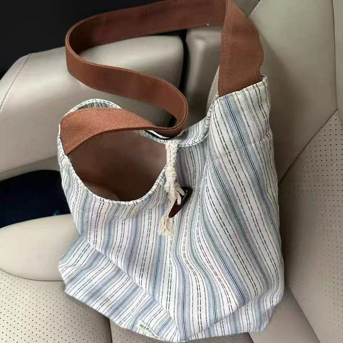 Wholesale Single shoulder commuting bag, new versatile striped large capacity tote bucket bag