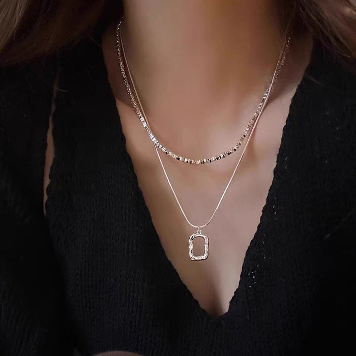 Wholesale Double layered necklace with light luxury and niche hollow block design, exquisite silver plated collarbone chain