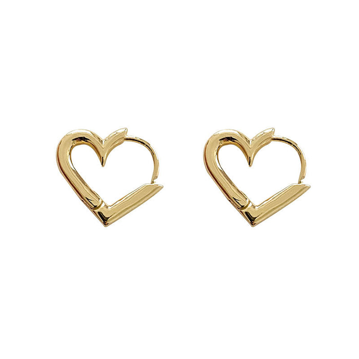 Wholesale Hollow out heart-shaped earrings for women with simple and delicate silver needle ear loops