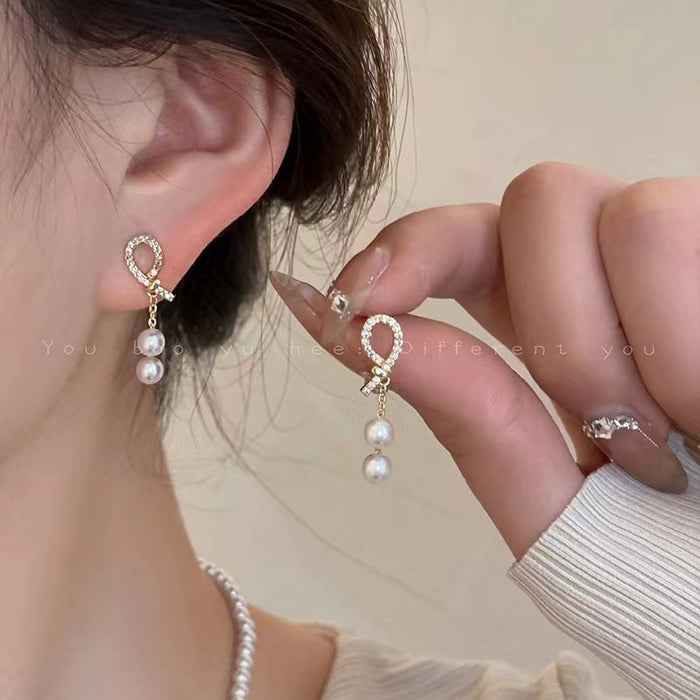 Wholesale Zirconia pearl earrings with unique and beautiful style