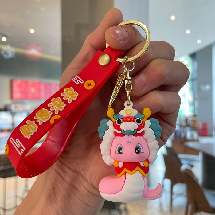 Wholesale Couple keychain, handbag pendant, car keychain, doll machine, small gift