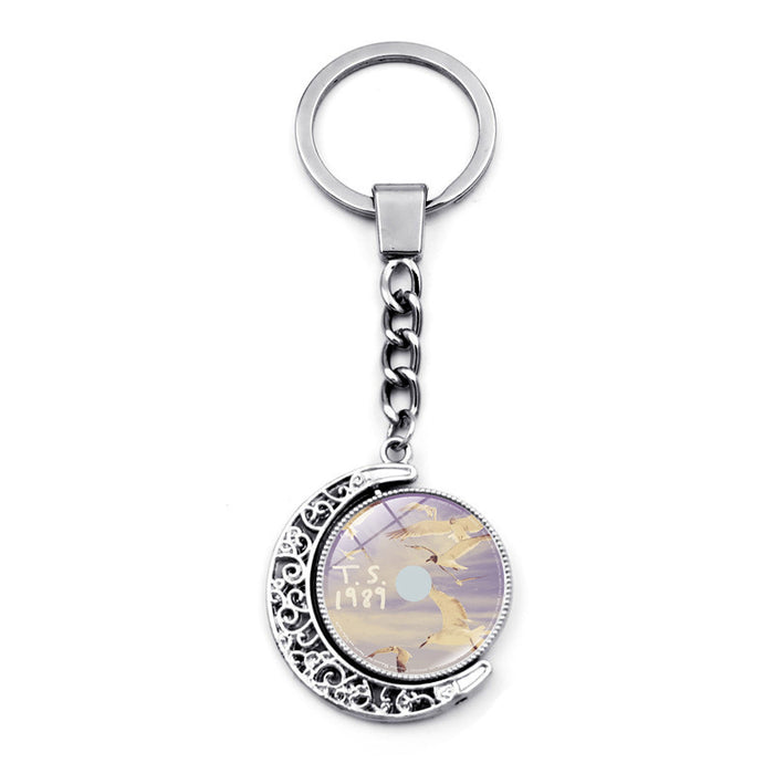 Wholesale Crystal Glass Rotating Moon Pendant Keychains JDC-KC-HengX021