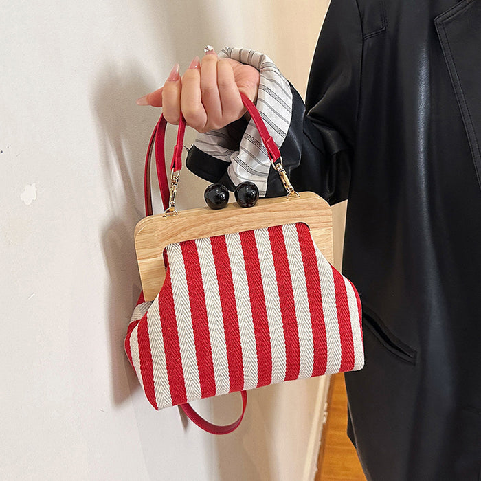 Wholesale Women' s striped canvas shoulder bag with wooden clasp