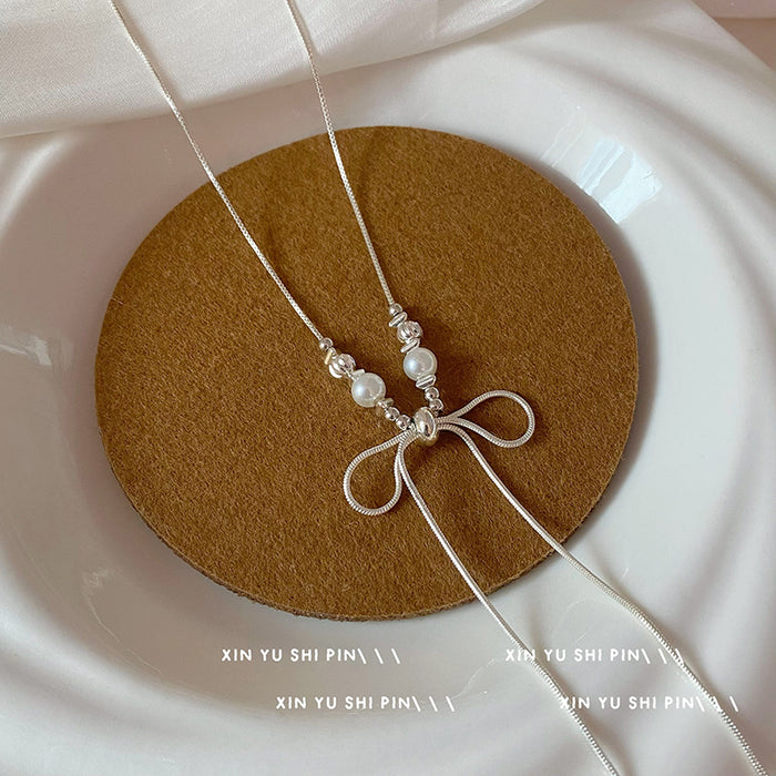 Wholesale Super beautiful bow long necklace, light luxury temperament, niche collarbone chain, fashionable and versatile necklace