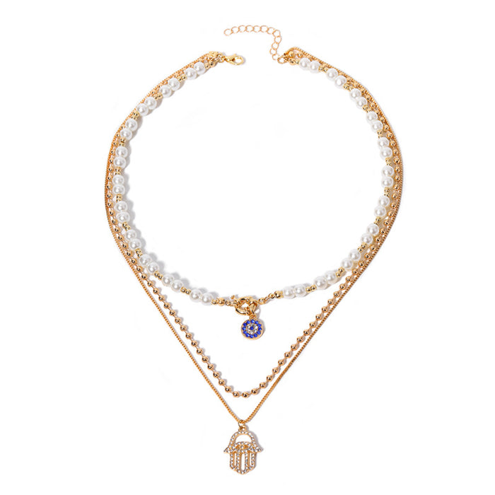 Wholesale New exaggerated jewelry alloy diamond inlaid multi-layer necklace for women, pearl eyes, palm pendant