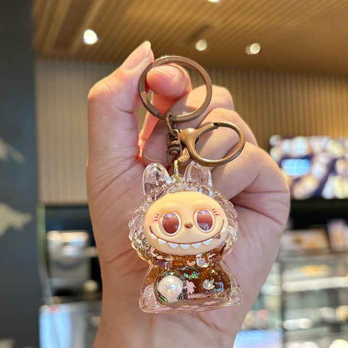 Wholesale Crystal oil-filled bottle keychain backpack charm