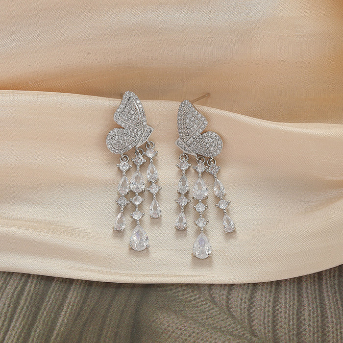 Wholesale Feather tassel earrings, retro fashion earrings, niche high-end, exaggerated earrings