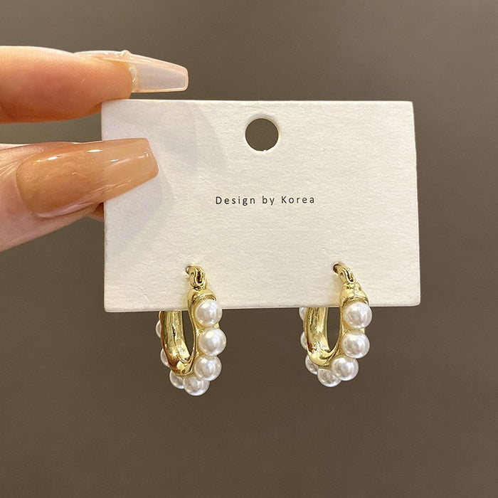 Wholesale Retro high-end pearl earrings, fashionable and simple U-shaped ear buckles, personalized and niche temperament earrings