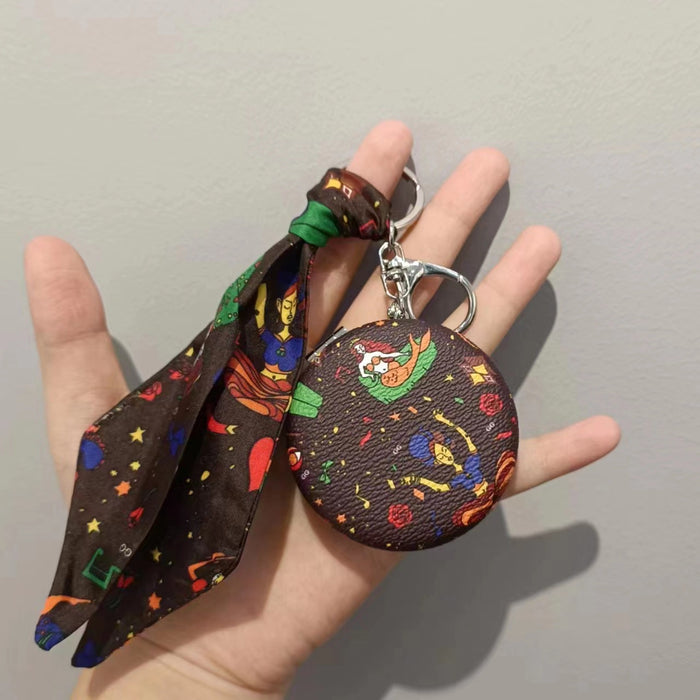 Wholesale light luxury and exquisite presbyopic leather cosmetic mirror key chain pendant double-sided mirror bag pendant JDC-KC-JiYou007