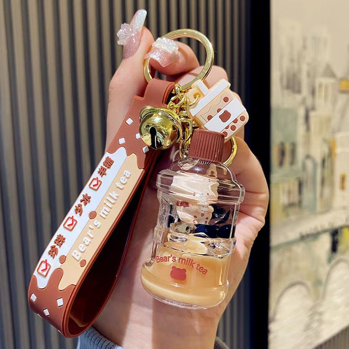 Wholesale bubble tea keychain floating small milk bear liquid quicksand bottle pendant couple gift bag hanging ornaments for women