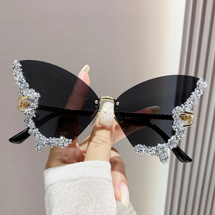 Wholesale New butterfly studded diamond rimless sunglasses with fashionable and exaggerated personality