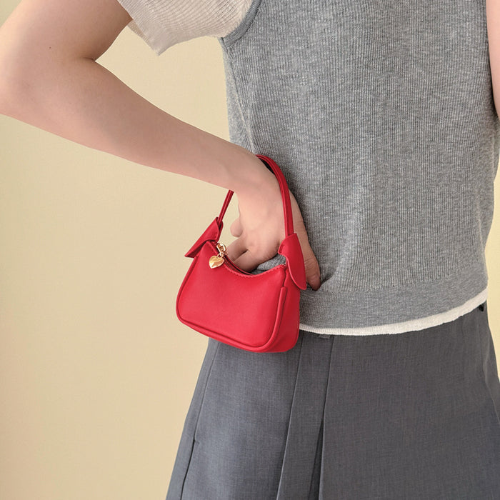 Wholesale Korean Style Solid Color PU Children' s Handbag with Heart Zipper Pull Cute Casual Accessory