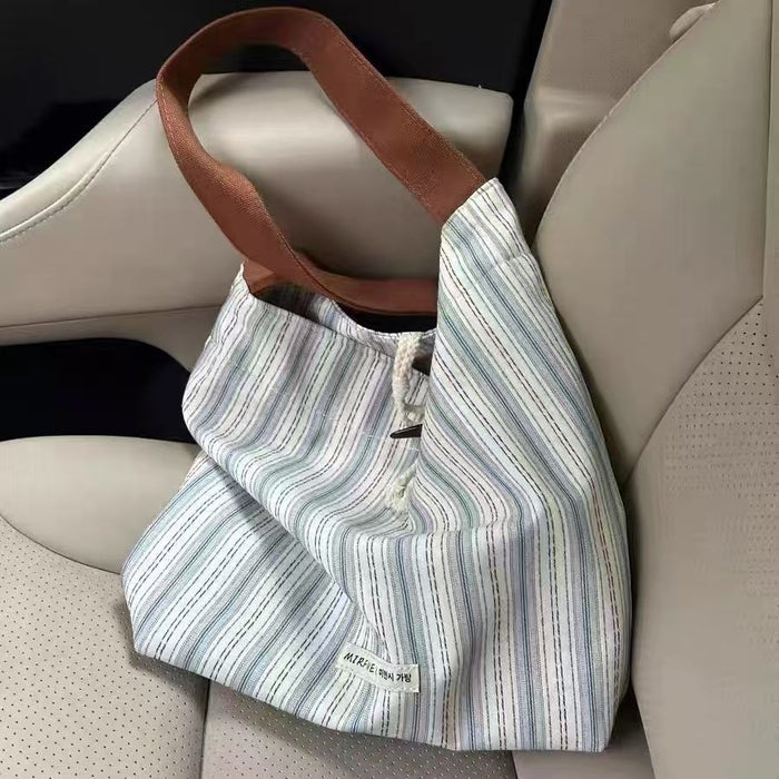 Wholesale Large capacity commuting shoulder tote bag canvas bag fashionable casual armpit bag