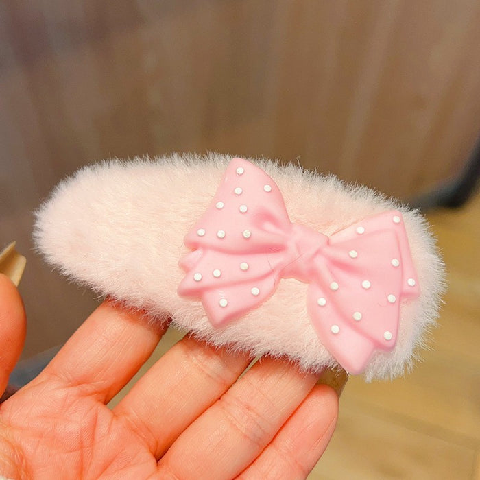 Wholesale Cute and able plush hair clip featuring a cat wearing glasses.