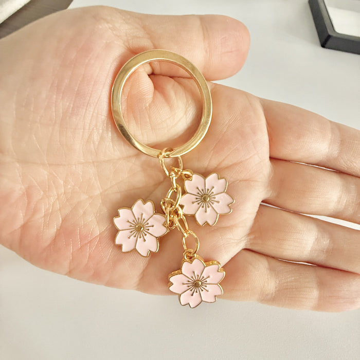 Wholesale Sweet cherry blossom keychain flower flower metal handbag backpack pendant decoration accessories