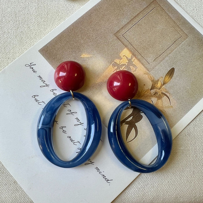 Wholesale Red and blue contrasting geometric ring earrings exude a literary and artistic atmosphere, with personalized and niche earrings for women