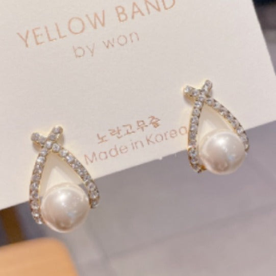 Wholesale Silver needle pearl earrings, simple new style, high-end temperament, earrings, light luxury earrings