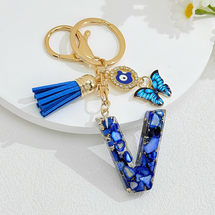 Wholesale Royal Blue 26 Letter Keychain with Evil Eye Butterfly Tassel Pendant