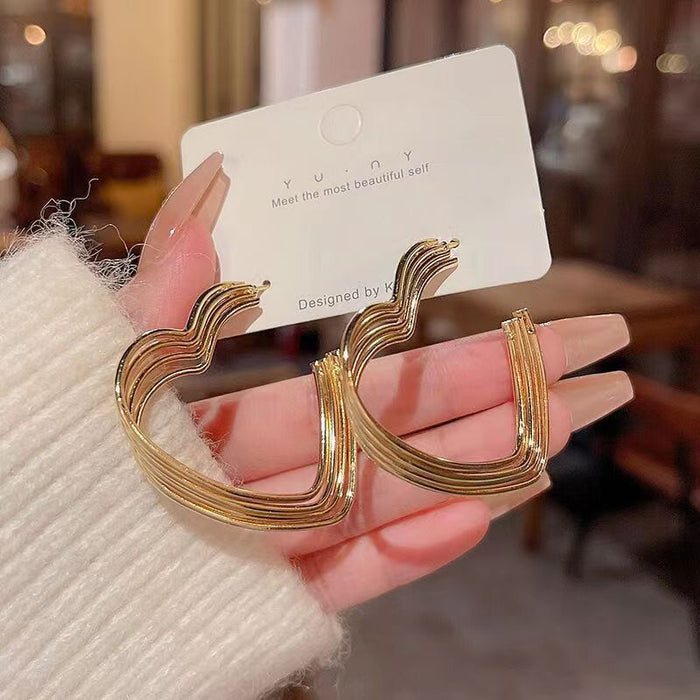 Wholesale Geometric heart-shaped exaggerated personality fashion woven earrings wholesale