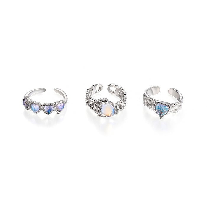 Wholesale Set of open-faced diamond-encrusted heart-shaped rings.