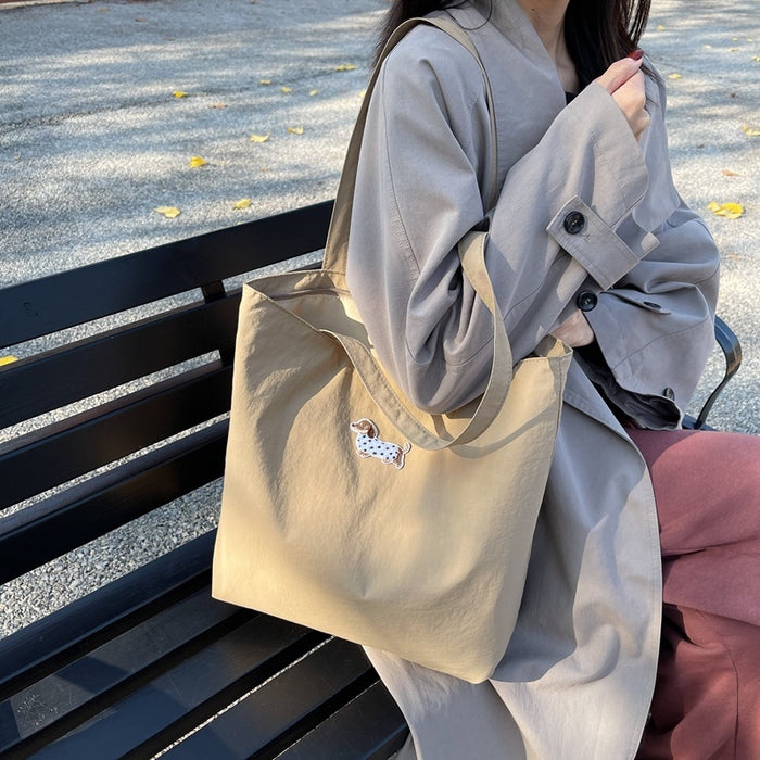 Wholesale Large capacity canvas bag, niche commuting handheld, high-end fashion shoulder bag