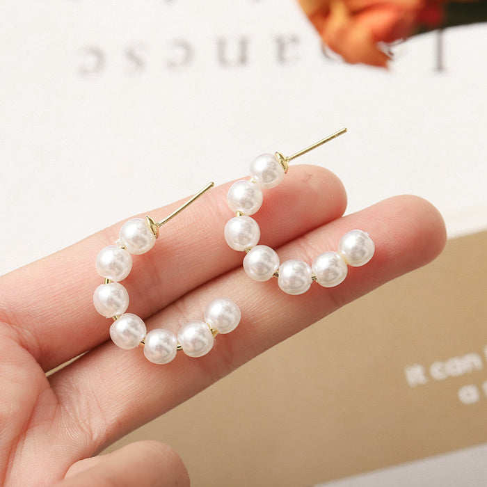 Wholesale Circle pearl earrings with a high-end feel, new round earrings, and earrings
