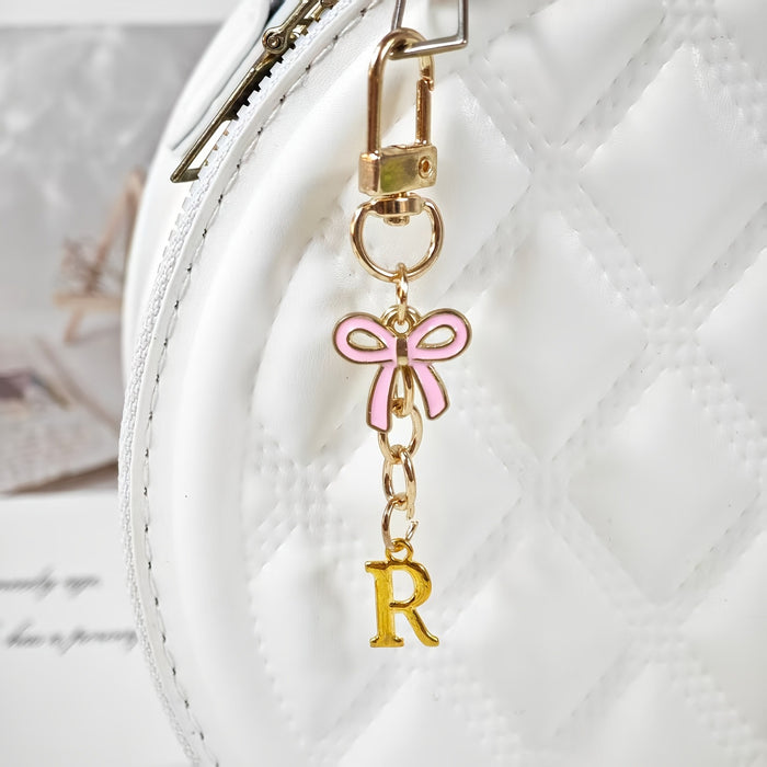 Wholesale Pink bow A-Z keychain alloy accessory