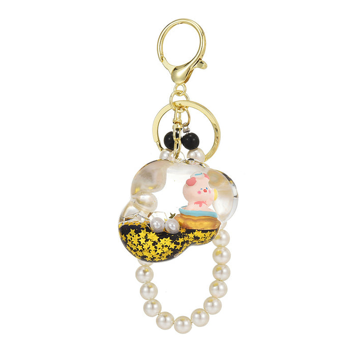 Wholesale Oil-Filled Black Gold Quicksand Piggy Liquid Keychain
