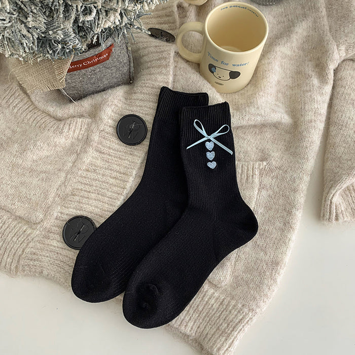 Wholesale Embroidered heart-shaped tube socks with blue ribbon and bow, stacked socks