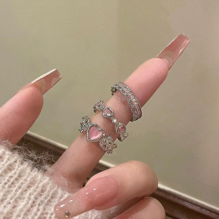 Wholesale Set of open-faced diamond-encrusted heart-shaped rings.