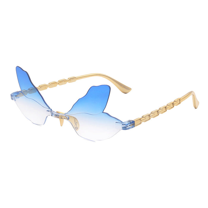 Wholesale Dragonfly shaped frameless sunglasses, personalized, penetrating, funny, decorative sunglasses