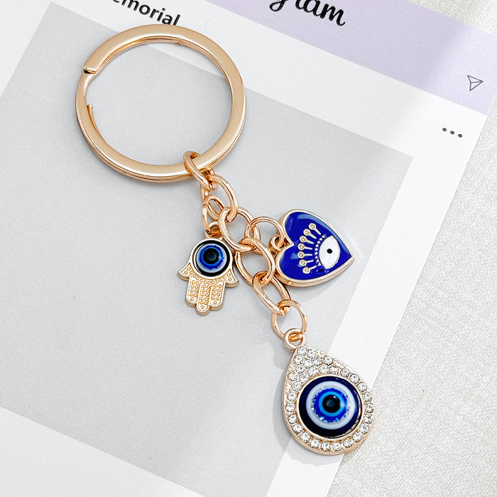 Wholesale Heart-Shaped Palm Water Drop Devil's Eye Pendant Keychain