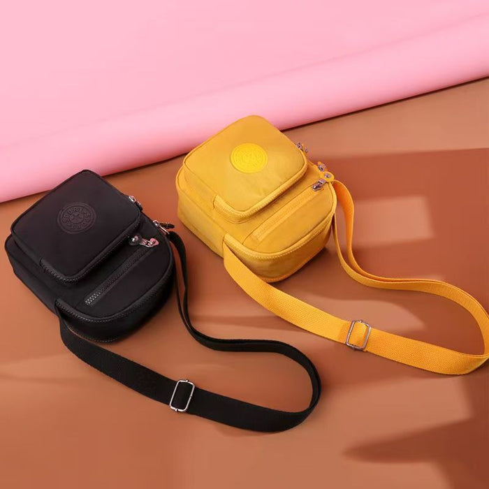 Wholesale Women' s canvas bag portable ladies messenger bag Oxford cloth casual shoulder bag vertical small bag