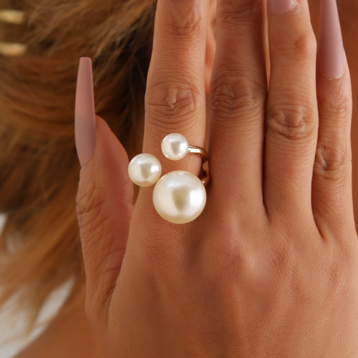 Wholesale Three faux pearl rings with metal bases