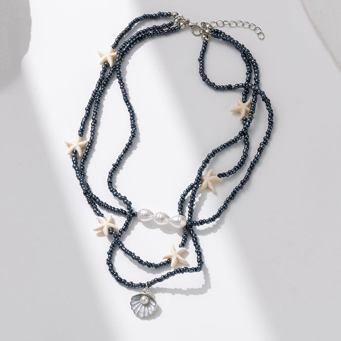 Wholesale New stacked black bead starfish necklace shell pendant necklace, personalized and fashionable collarbone chain