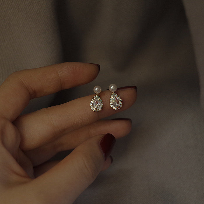 Wholesale  water drop pearl earrings female temperament niche design  mosquito coil ear clip decoration
