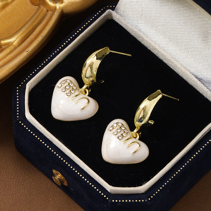 Wholesale Love earrings, niche design, light luxury, high-end, silver needle earrings, temperament